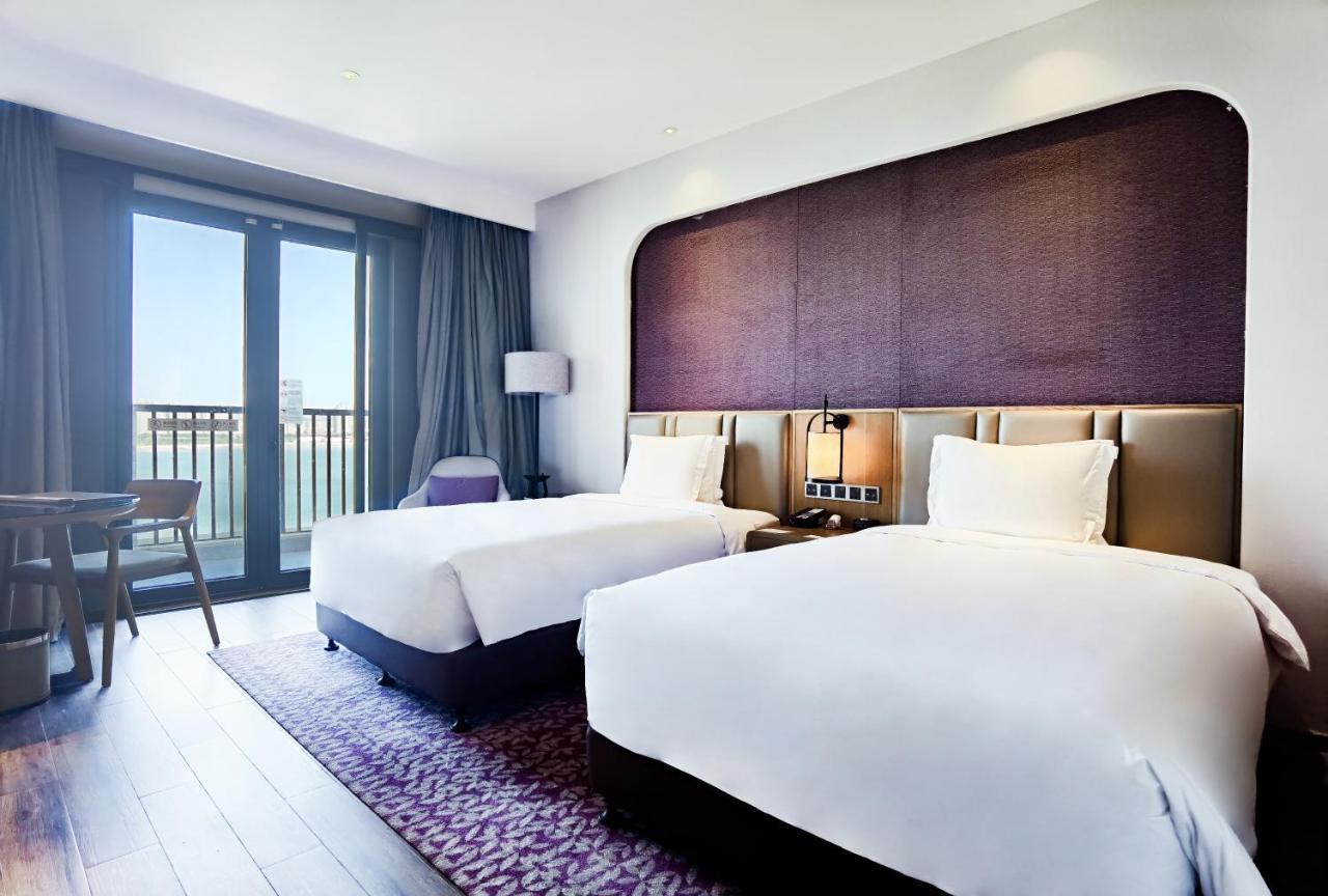 Hotel Crowne Plaza QingdaoOrientalMovieMetropolis Exterior foto