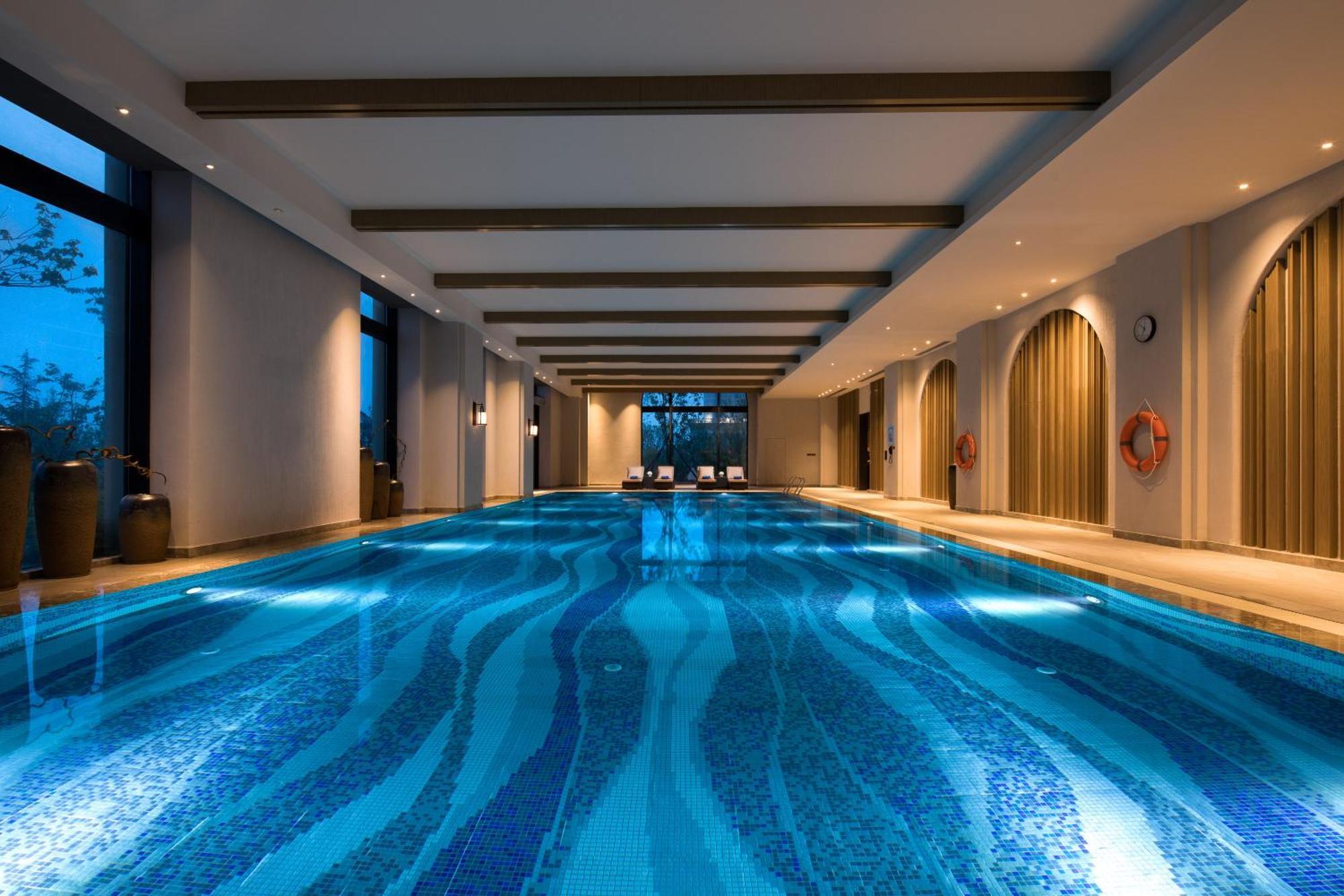 Hotel Crowne Plaza QingdaoOrientalMovieMetropolis Exterior foto